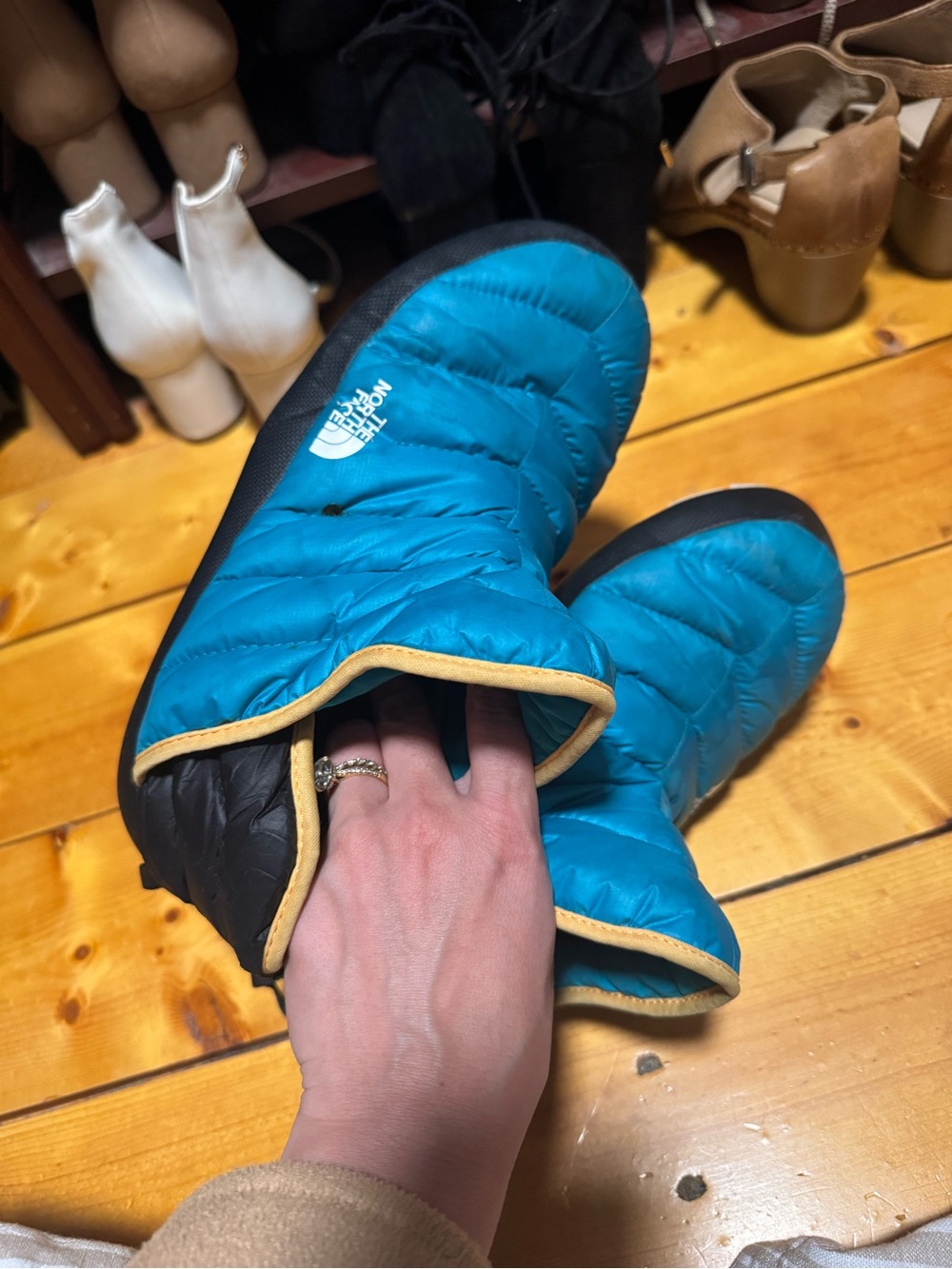 The North Face Teal and Black Quilted Slip-On Booties with Tan Trim